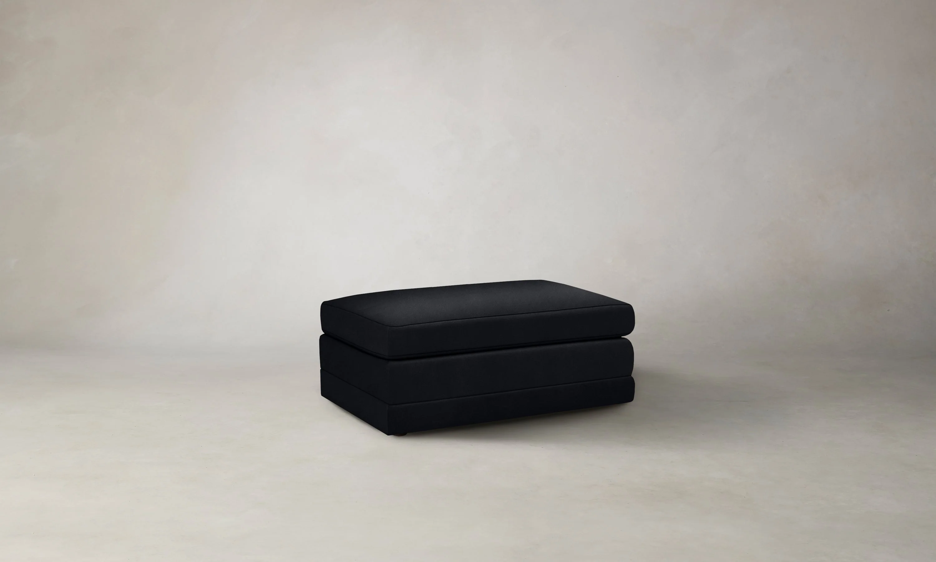 The Warren Ottoman - Costa Leather Jet